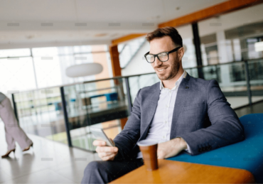 demo-attachment-478-businessman-taking-a-break-with-a-cup-of-coffee-JW4B3DH
